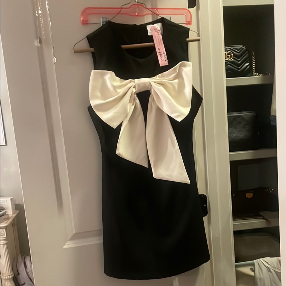 Black dress with white bow